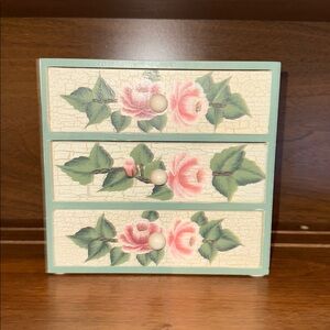 decorative miniature cabinet featuring hand-painted floral art